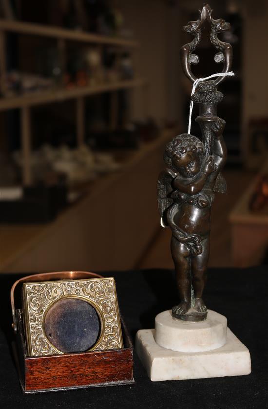 A bronze Putti, tray and photo frame